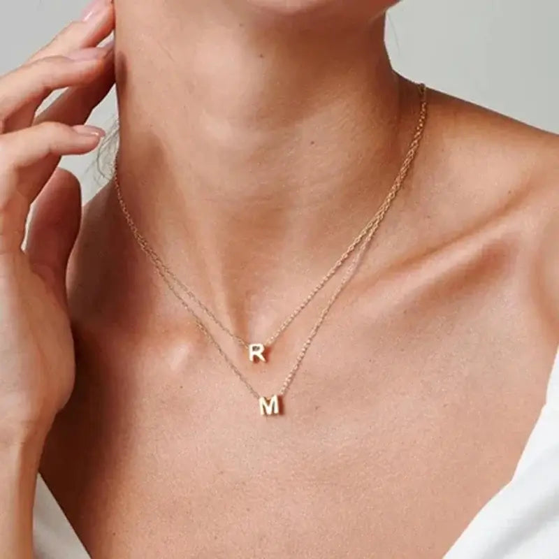 The double monogrammed necklace looks beautiful on you.
