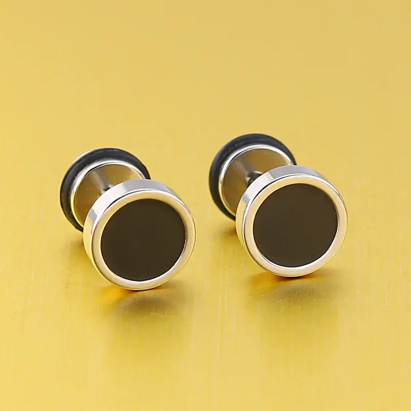 Pair of stainless steel silver black stud earrings.