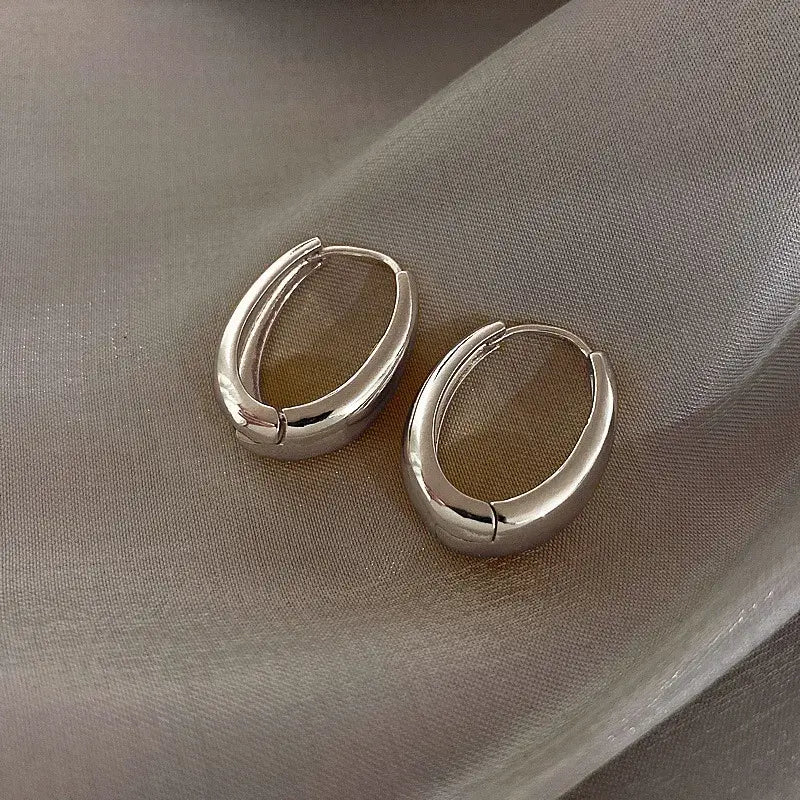 Sleek Silver Open Oval Hoop Earrings