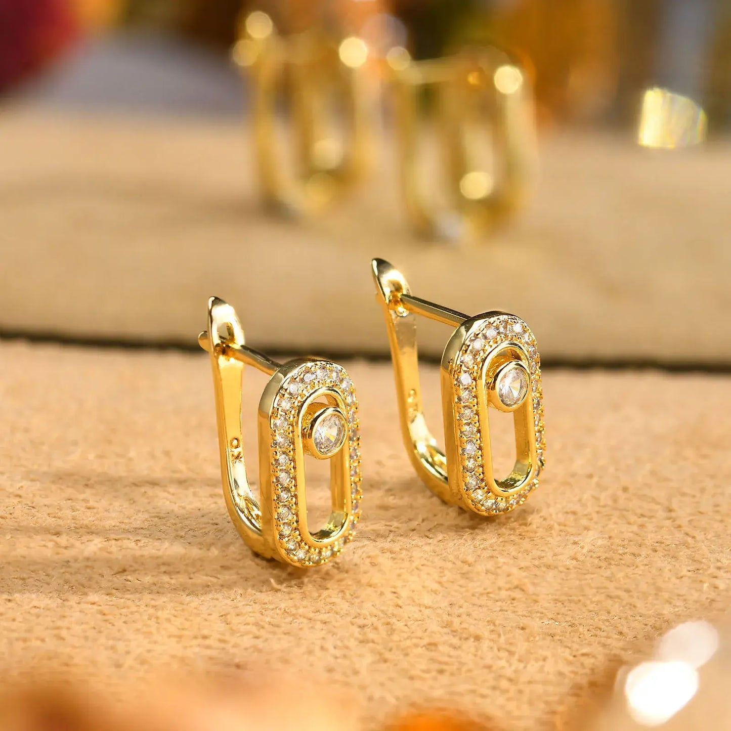 Three-dimensional geometric paper clip earrings