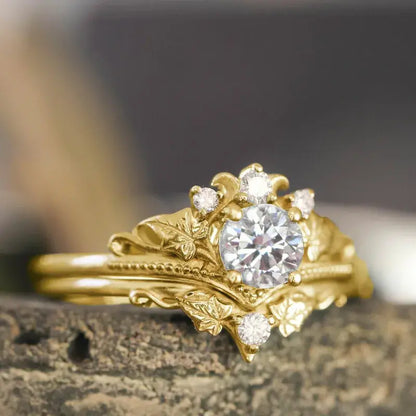 Crown zircon ring shown from the left side, showcasing detailed craftsmanship and sparkling stones