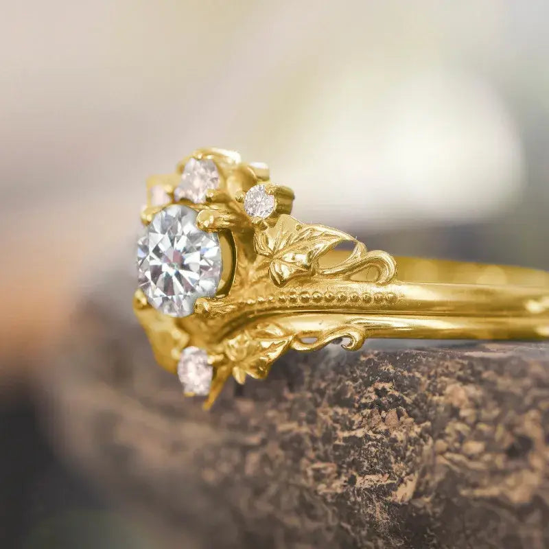 Crown-shaped zircon ring photographed from the right side, highlighting its sparkling stones and intricate design